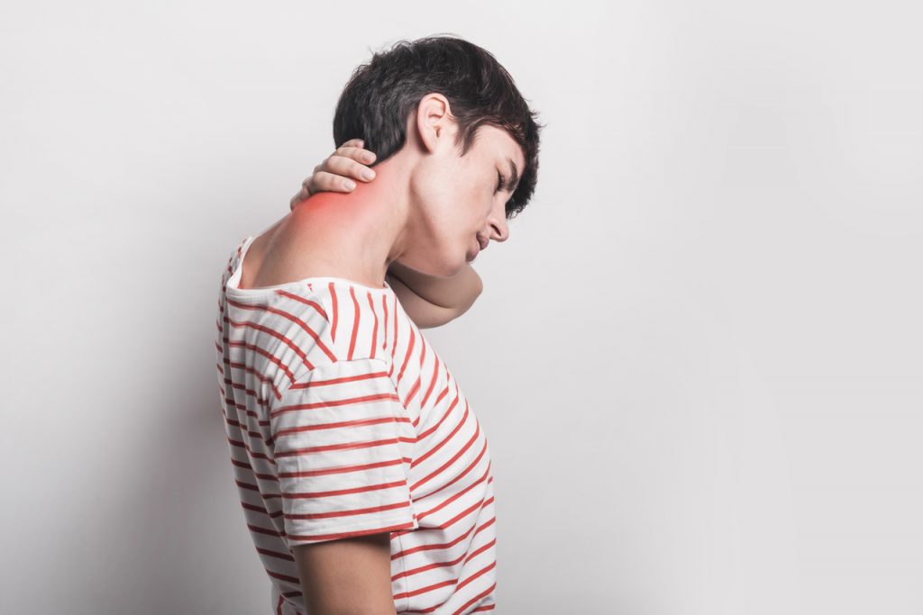 A woman having neck pain