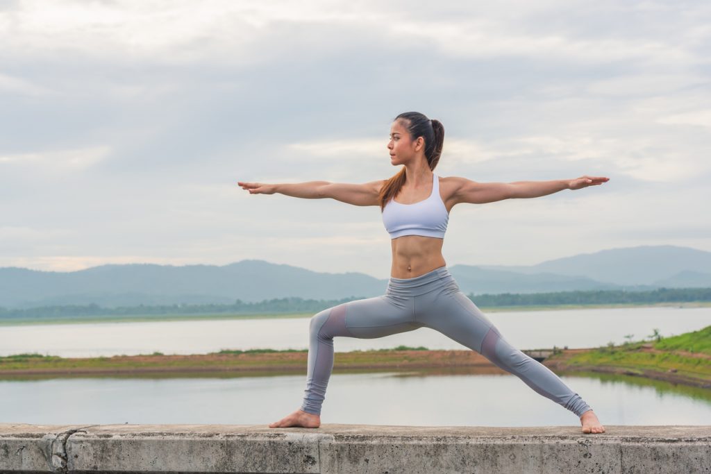 A woman doing a yoga stretch