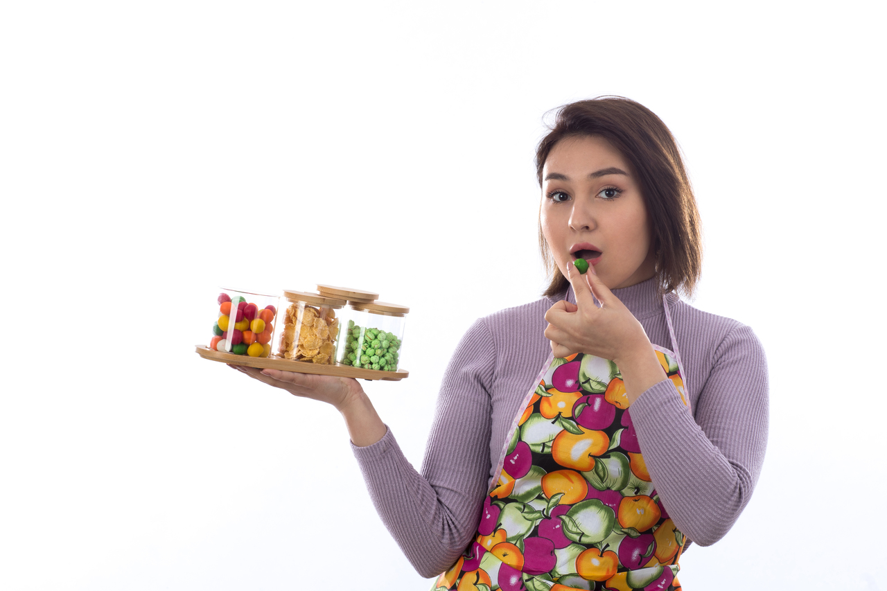 A woman eating sweets