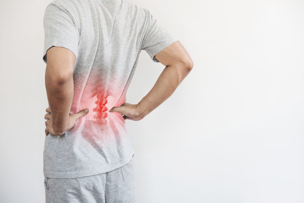 A man experiencing lower back pain
