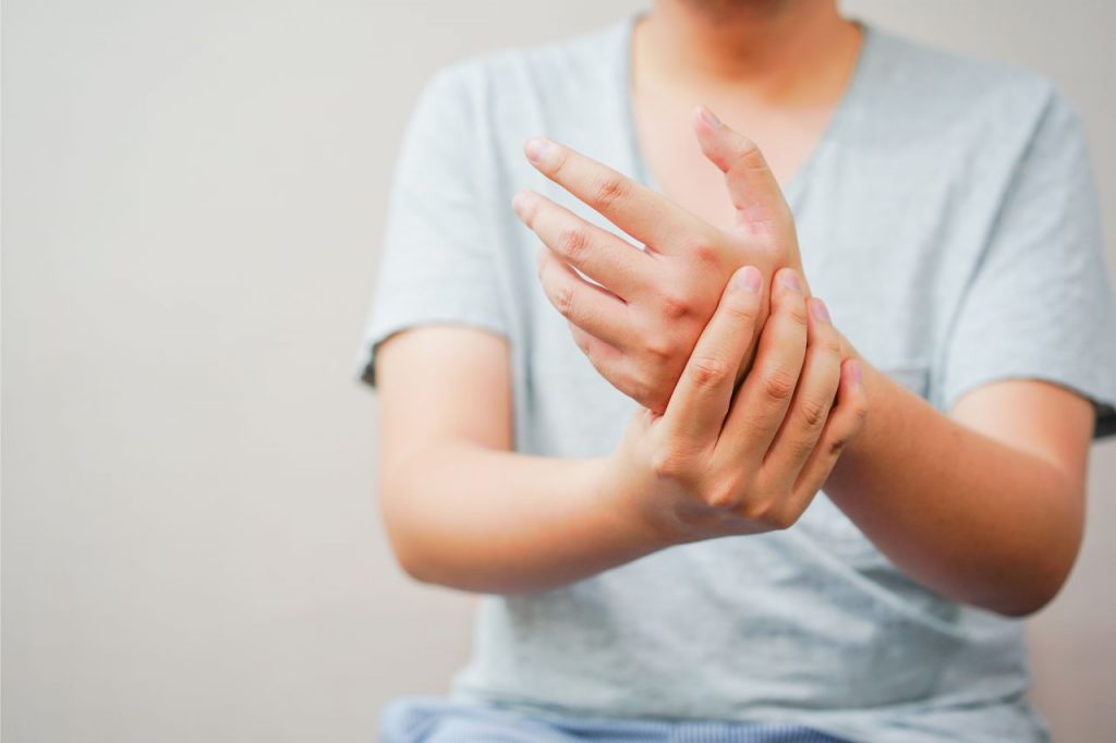Woman experiencing wrist pain