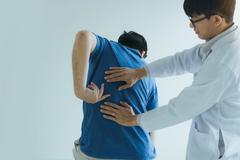 Patient getting a check up from a chiropractor